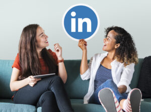 woman-holding-linkedin-logo