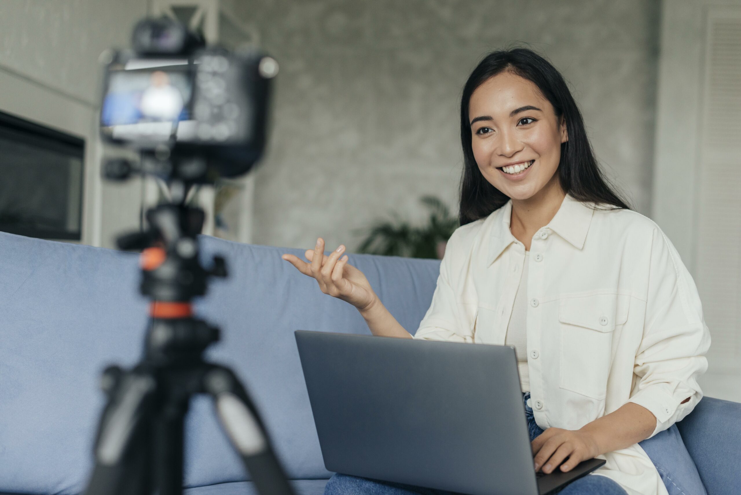 A woman recording a video resume.
